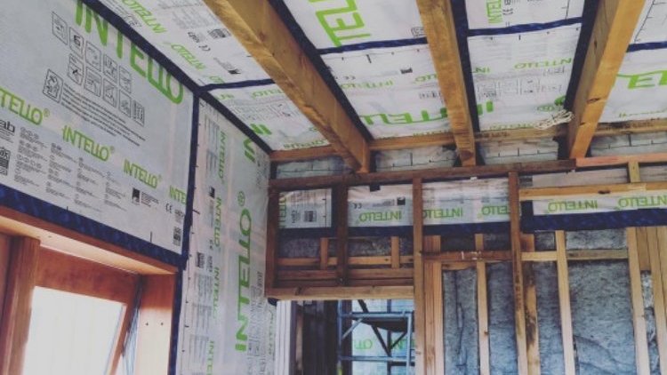 Raglan House - INTELLO<sup>®</sup> airthitness membrane installed on the inside of the framing of both walls and roof